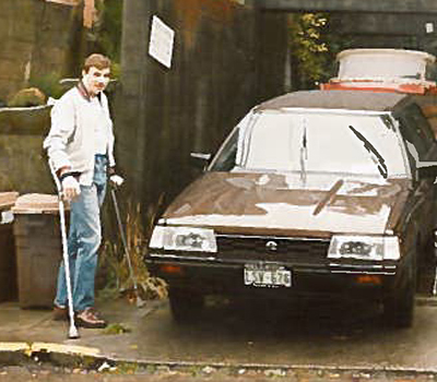 Phil Devitte to gym on crutches